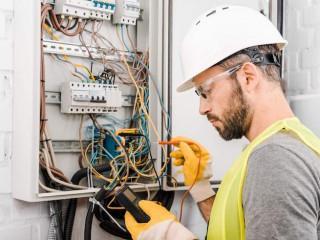handsome-electrician-checking-electrical-box-with-2021-08-29-22-35-45-utc (1)