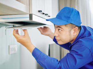 handyman-installing-cooker-hood-2021-08-27-21-23-56-utc